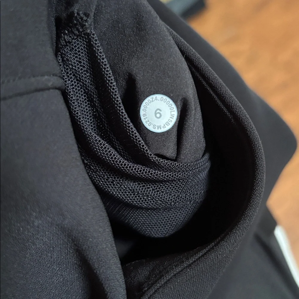 Lululemon On The Fly Pant Black Woven 27” Inseam - Picture 5 of 5